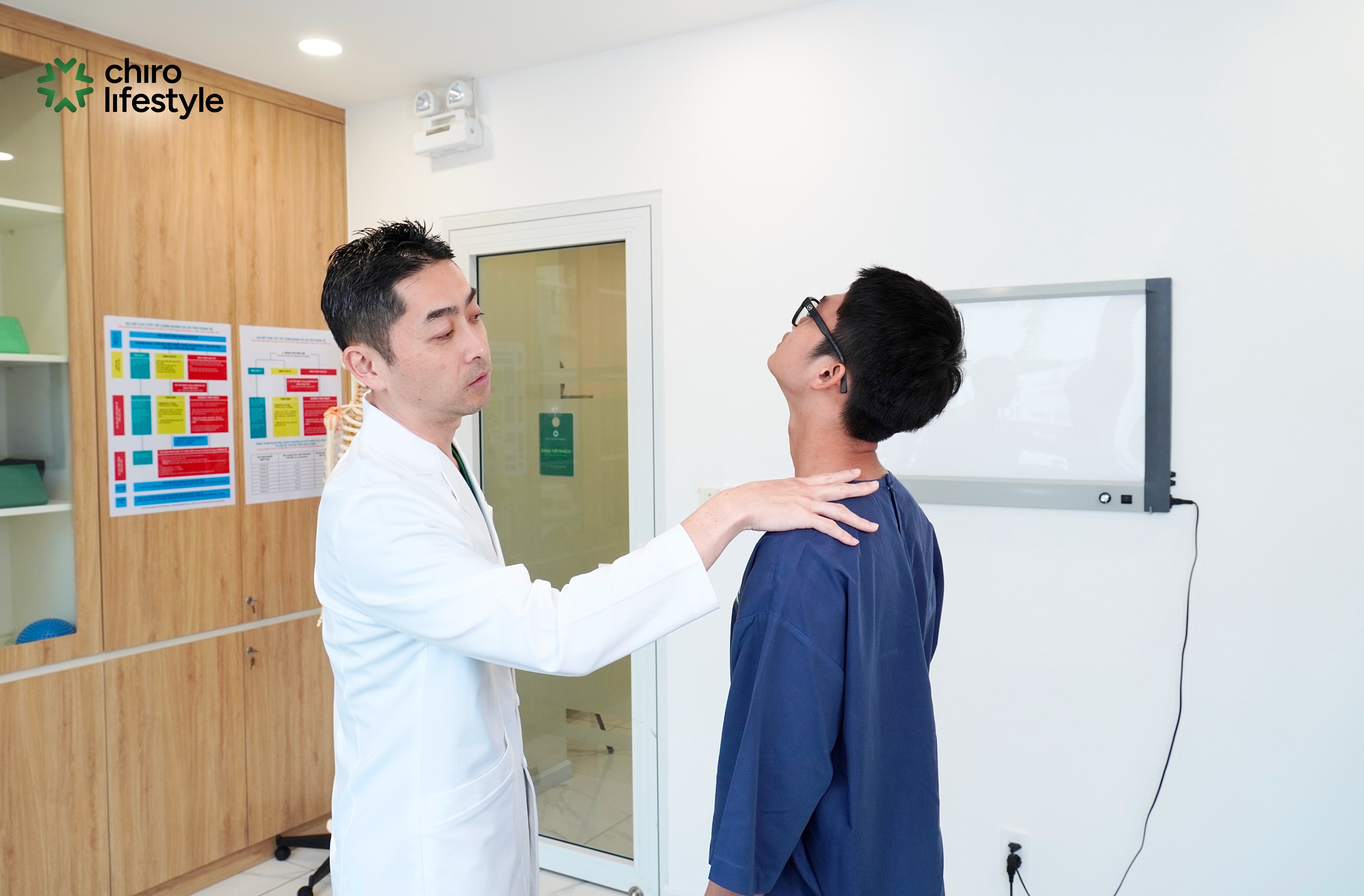 The chiropractor evaluates the entire neck, shoulder, and upper back area before performing adjustments.